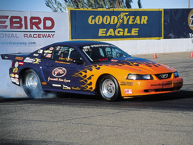 0405mm_10z Ford_Mustang Front_Passenger_Side_View_At_Track