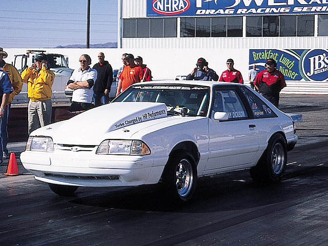 0405mm_11z Ford_Mustang Front_Drivers_Side_View_At_Track