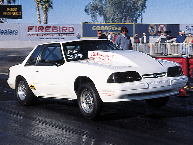 0405mm_27z 1988_Ford_LX Front_Passenger_Side_View_At_Track
