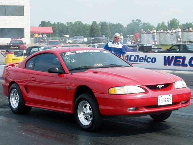 0211mmff_02zoom 1998_Ford_Mustang Passenger_Side_View_At_Track