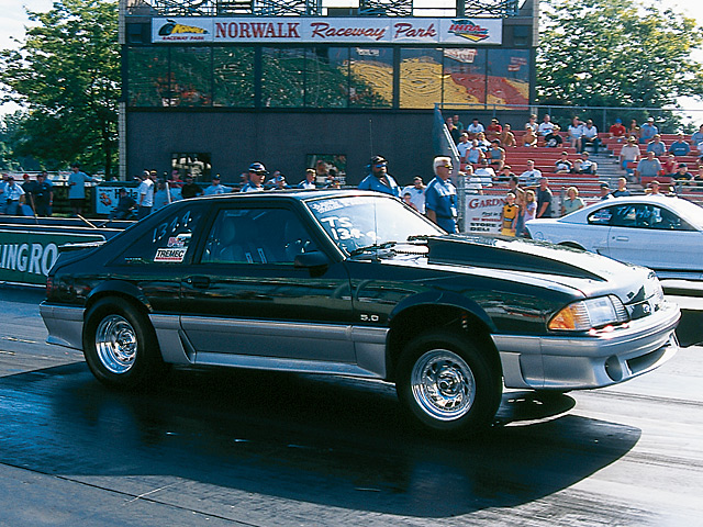 0412mm_07z 1988_Ford_Mustang_GT Passenger_Side_View_At_Track