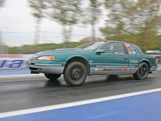 Mmfp_0609_shoot_01_z Turbo_coupes_vs_super_coupes 1996_mercury_cougar_launching