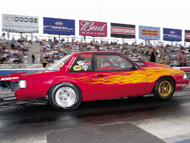 0310mm_14z Ford_Mustang Passenger_Side_View_At_Track