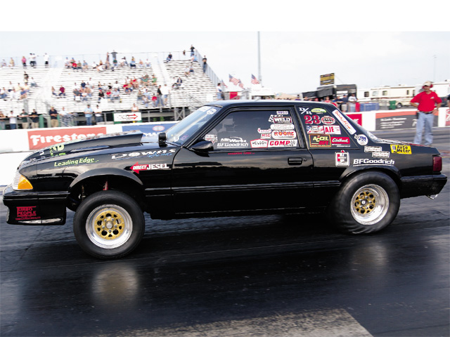 0310mm_17z Ford_Mustang Drivers_Side_View_At_Track
