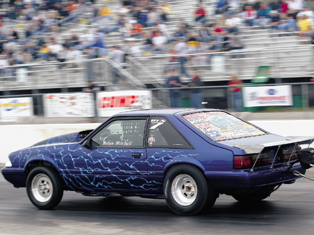 0310mm_25z Ford_Mustang Drivers_Side_View_At_Track