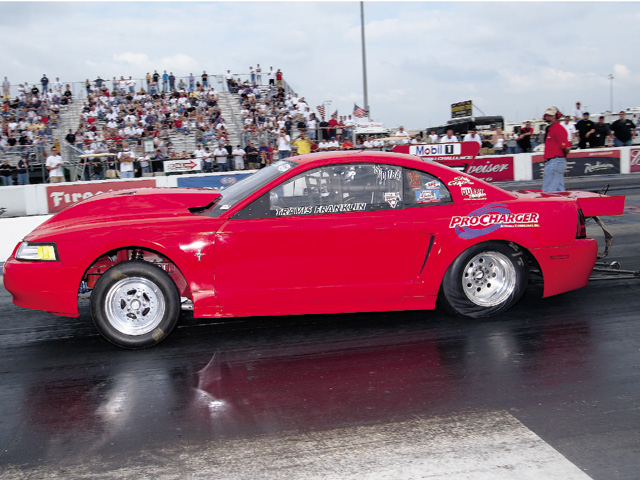 0310mm_23z Ford_Mustang Drivers_Side_View_At_Track