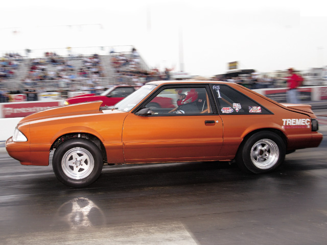 0310mm_27z Ford_Mustang Drivers_Side_View_At_Track