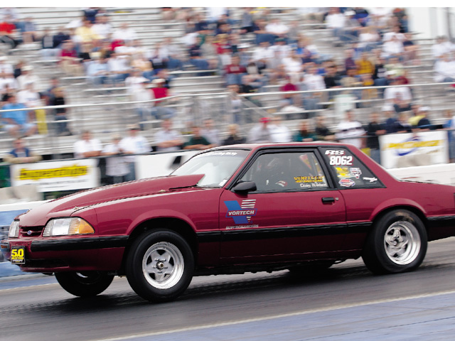 0310mm_29z Ford_Mustang Drivers_Side_View_At_Track
