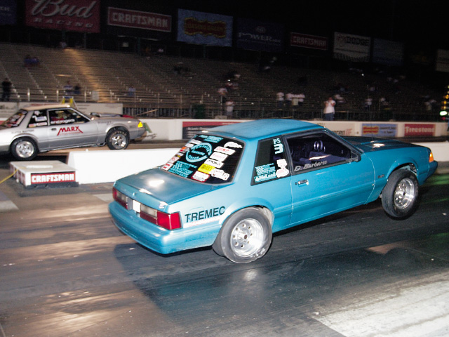 0310mm_26z Ford_Mustang Passenger_Side_View_At_Track
