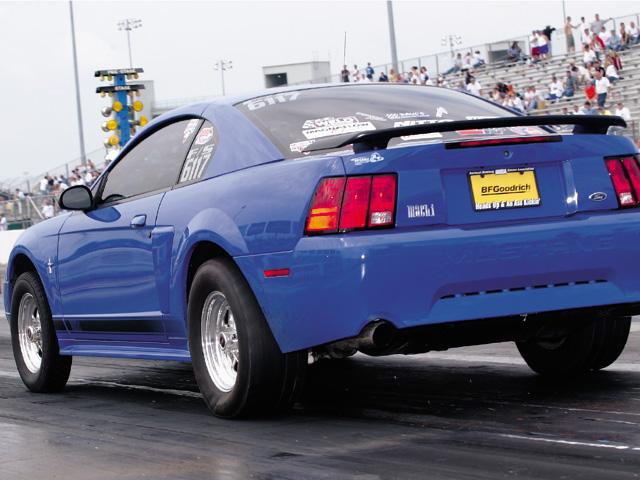 0310mm_32z Ford_Mustang_Mach_1 Rear_Drivers_Side_View_At_Track
