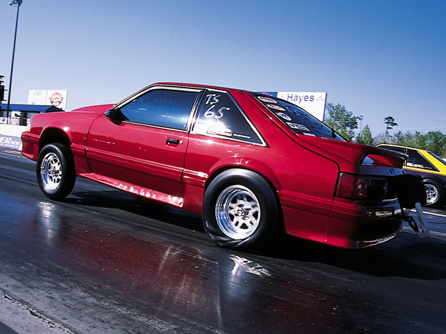 0308mm_11z Ford_Mustang Drivers_Side_View_At_Track