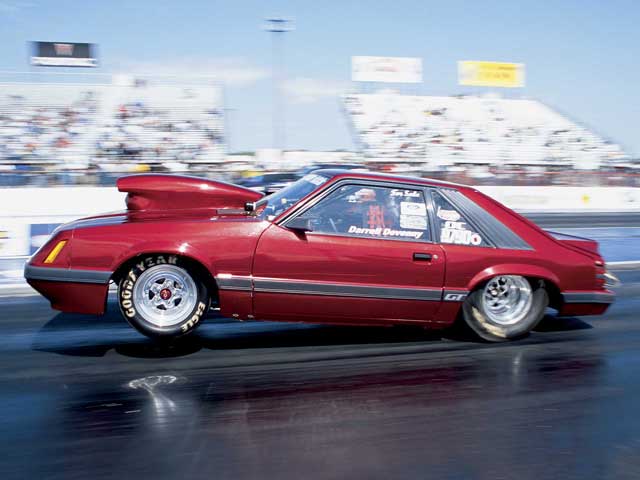 Mmfp_0509_01z Ford_Mustang Drivers_Side_View_At_Track