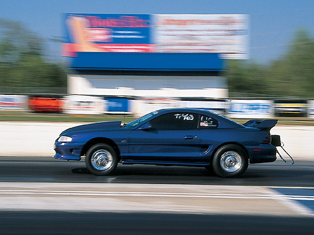 0408mm_11z 1995_Ford_Mustang Driver_Side_View_At_Track